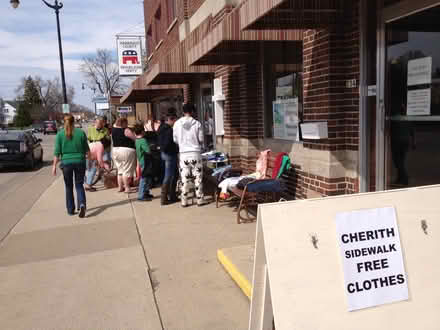 Photo of free Clothing on sidewalk (734 N Main St, Oshkosh, WI) #1