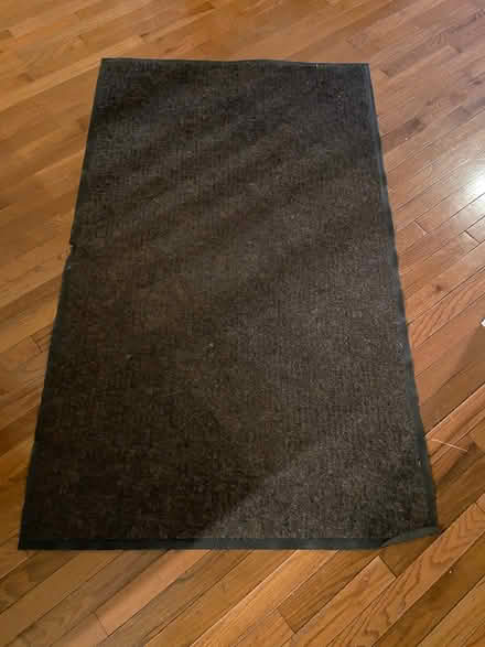 Photo of free Thin dark grey rug no skid (Columbia Heights) #1