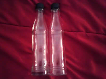 Photo of free 2 hot sauce bottles & plastic caps (Kensington) #1