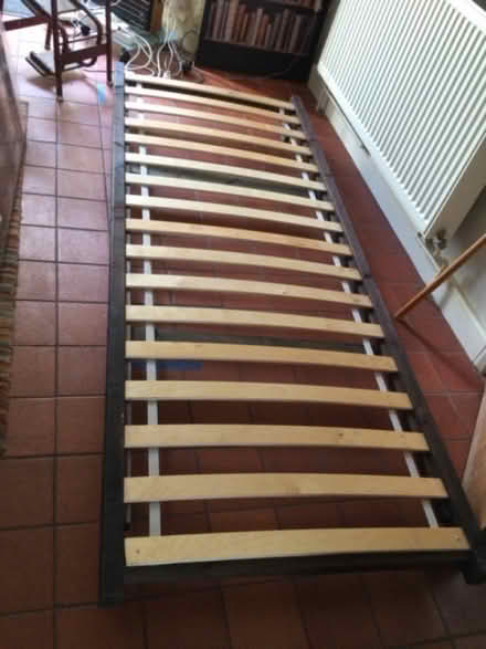 Photo of free Low level single (2'6" wide x 6'3") bed on wheels (islington N1) #2