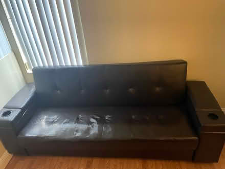 Photo of free Black Leather Futon Couch (North Hollywood) #2