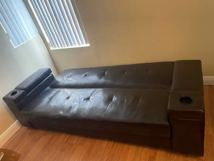 Photo of free Black Leather Futon Couch (North Hollywood) #3