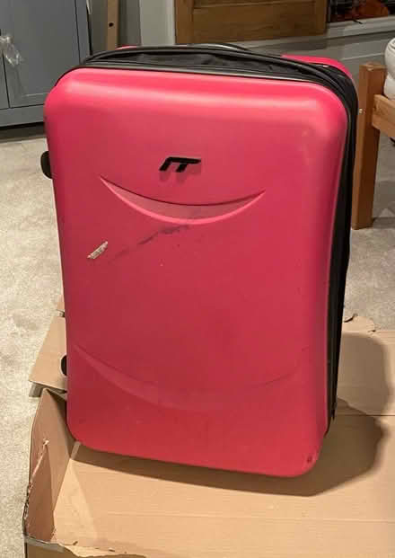 Photo of free Large pink suitcase (Hampton Peterborough) #3