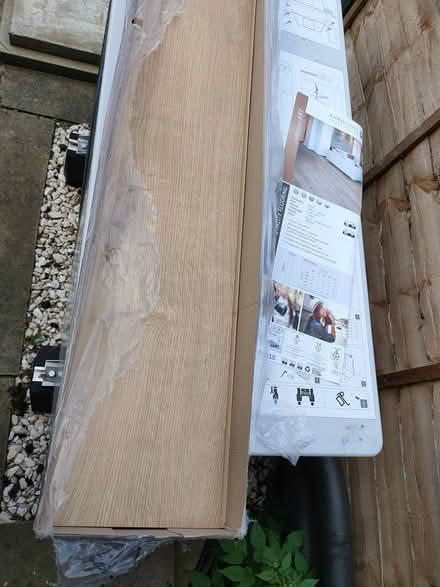Photo of free 2 leftover planks laminate flooring (EH17 Gilmerton) #1