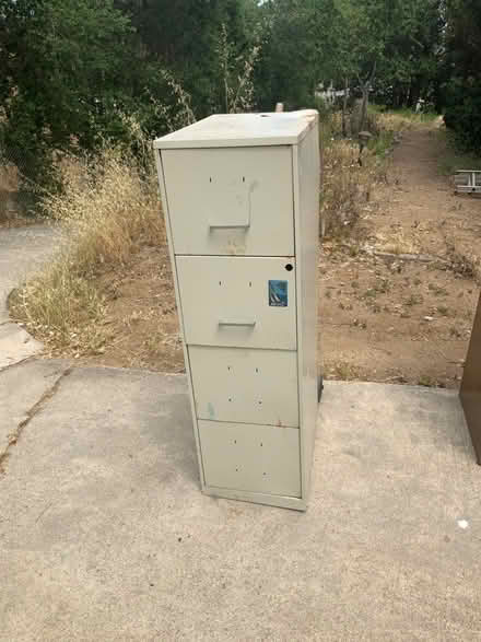 Photo of free 4 door File Cabinet (Just off bear valley Escondido) #1