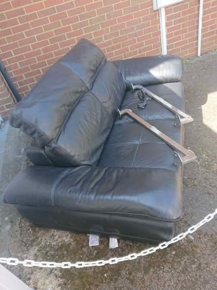 Photo of free 2 seater real leather sofa (Southfields) #1