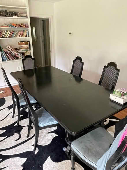 Photo of free Wood table w 6 cane back chairs (78722) #1
