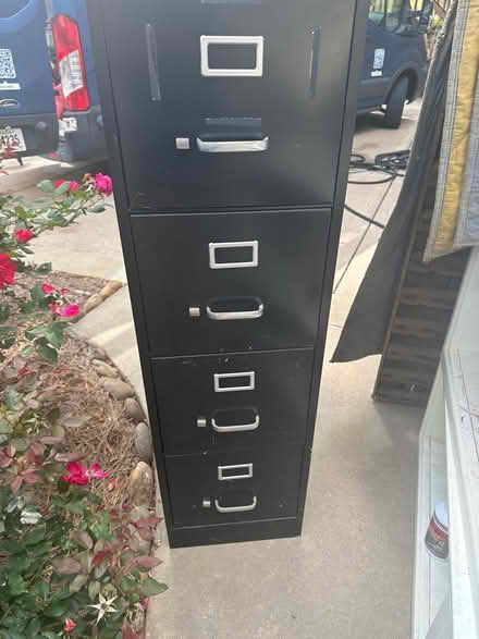 Photo of free Black four drawer cabinet (North Buckhead) #1