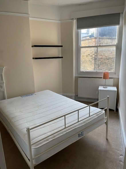 Photo of free Queen size double bed and mattress (Barons Court W14) #1