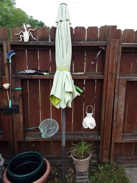 Photo of free 9 foot patio table umbrella (Ft Eustis) #1