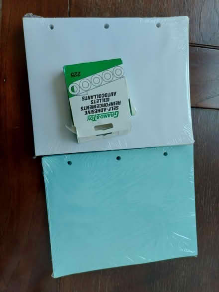 Photo of free 3 hole punched paper packages (319 Merton st) #1
