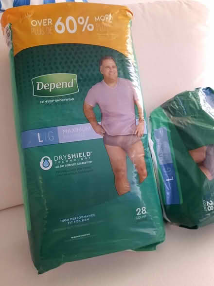Photo of free New Pkg. Male DEPENDS, L (Hunt Club / McCarthy Rd.) #1