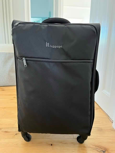 Photo of free Suitcase (wheels don’t all work) (TW9) #1