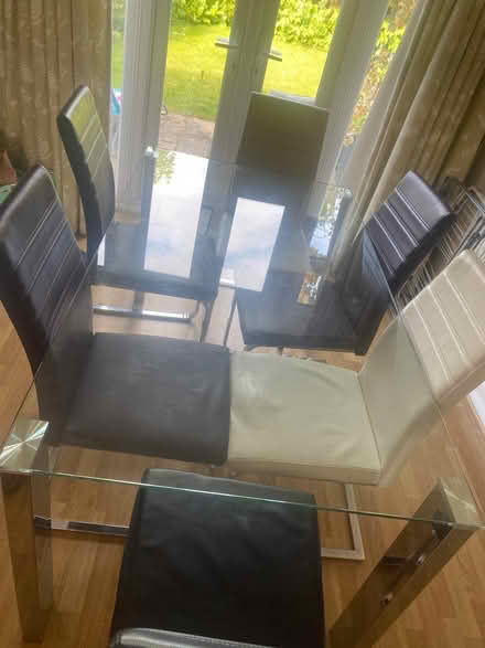 Photo of free Glass dining table with (CM23) #1