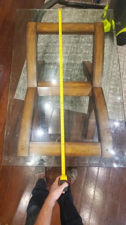 Photo of free Glass top wood base coffee table (Poughkeepsie) #1