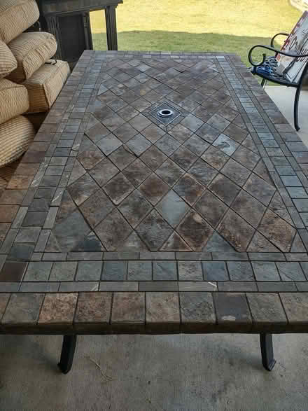 Photo of free Patio dining table and fireplace (Lilburn) #2