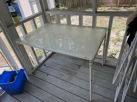 Photo of free Glass top table, acrylic chair (Winter Park) #1