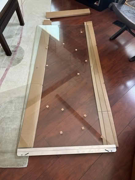 Photo of free Glass shower door (New) (Larkspur) #1