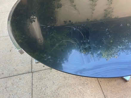 Photo of free Round black glass & chrome table (Old Street) #1