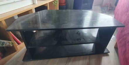 Photo of free black tv stand (G42) #1