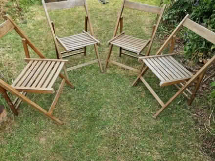 Photo of free 4x folding wooden garden chairs (Mattishall NR20) #1