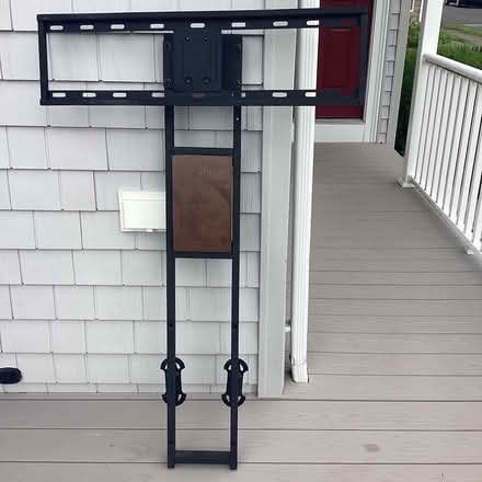 Photo of free Tv wall mount. NOT ugly (End of Beaver St) #3