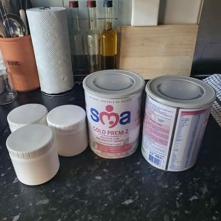 Photo of free Baby m8lk tins and plastic tubs (Great Lever BL3) #1