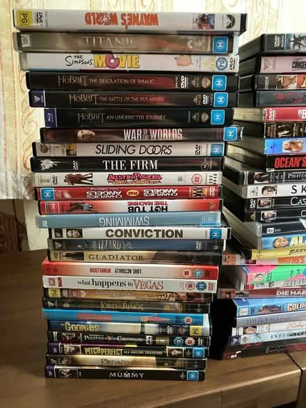 Photo of free DVD Player and stack of DVDs (NN14) #3