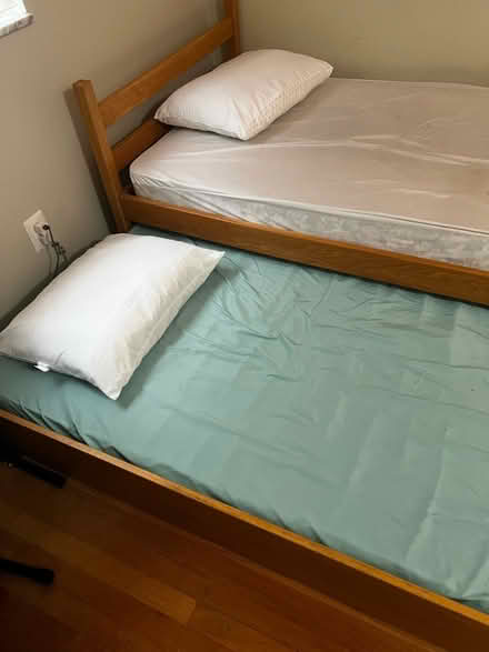 Photo of free Wood twin trundle bed frame only (13 btw Woodward & greenfield) #2
