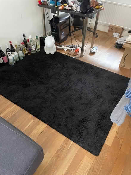 Photo of free Ikea black rug (Clapham south) #1