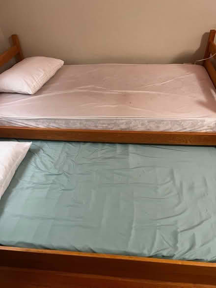 Photo of free Wood twin trundle bed frame only (13 btw Woodward & greenfield) #3