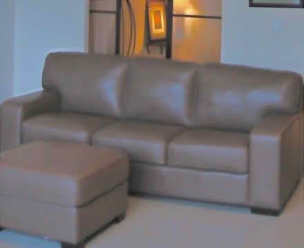 Photo of free Leather sofa and foot stool (Mid town Toronto) #1