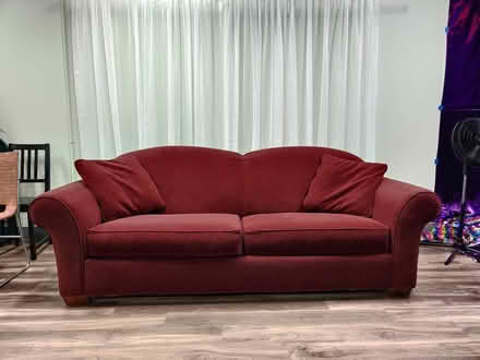 Photo of free Red/Maroon Couch (Near Baytown Arts District) #1