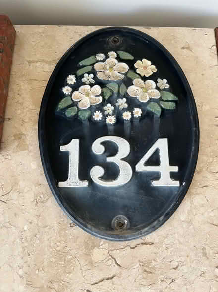 Photo of free 134 cast iron house sign (Cheam) #1