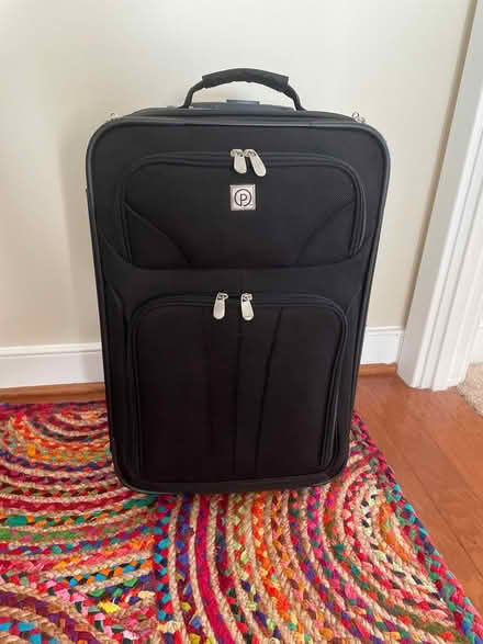 Photo of free Rolling carry-on suitcase (Carlyle) #1