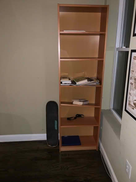 Photo of free Tall book shelf (Capitol Hill NE) #1
