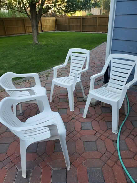 Photo of free 4 Plastic patio chairs and 2 tables (East Longmont) #1