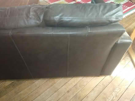 Photo of free Three-seater, dark brown leather sofa (Halstead CO9) #1
