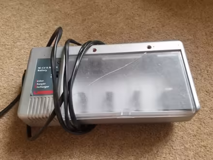 Photo of free Battery charger (Monimail KY15) #1