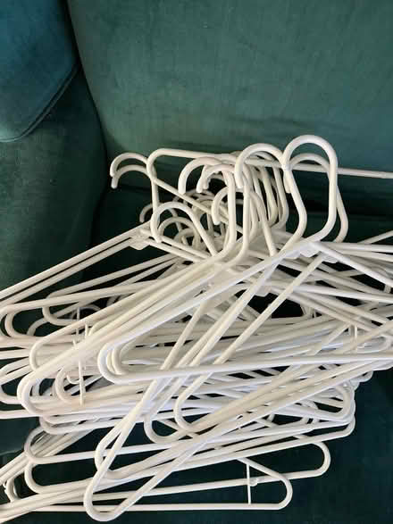 Photo of free White plastic hangers- 37 (Koreatown) #1
