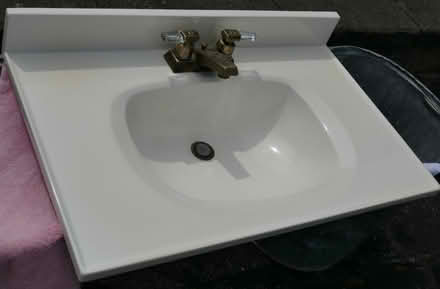Photo of free Bathroom vanity countertop & faucet (Viemount/Merivale area) #1