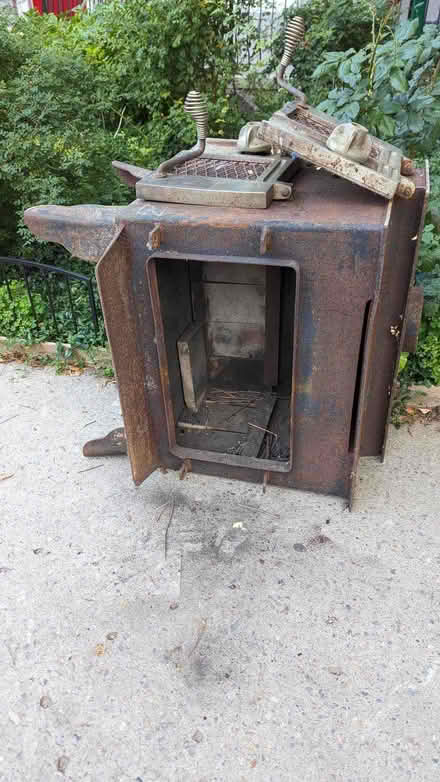Photo of free Curb alert - wood stove (Kensington Market) #1