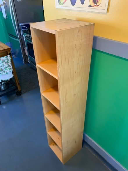 Photo of free Tall narrow shelf unit (San Leandro) #1