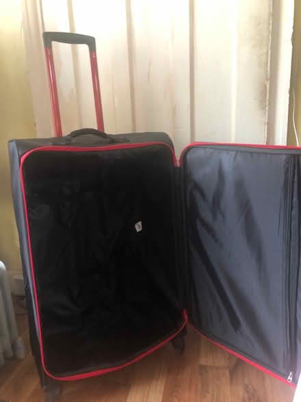 Photo of free Suitcase, minor damage (Skerton) #1