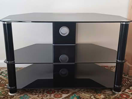 Photo of free Black glass television stand 80cm W x 45.5cm D x 49.5cm H (Presteigne LD8) #1
