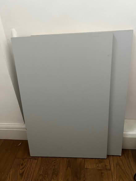 Photo of free 2 mdf grey wood pieces 49cm x 74cm (Chelsea SW3) #1
