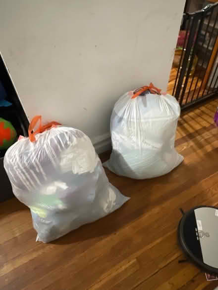 Photo of free 2 large bags of clothes, and sheets (Crown Heights) #1