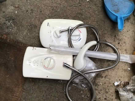 Photo of free Two electric showers. (Woodmancote GL52) #1