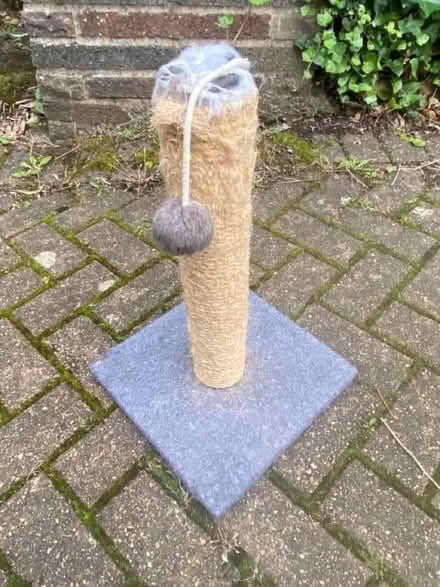 Photo of free Cat items, a wire cat carrying basket and scratching post. (GU52) #2