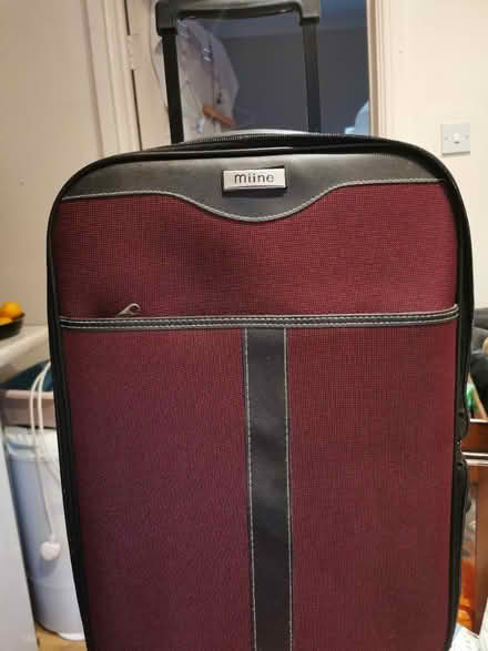 Photo of free 1 small and 1 large suitcases (NW2) #1